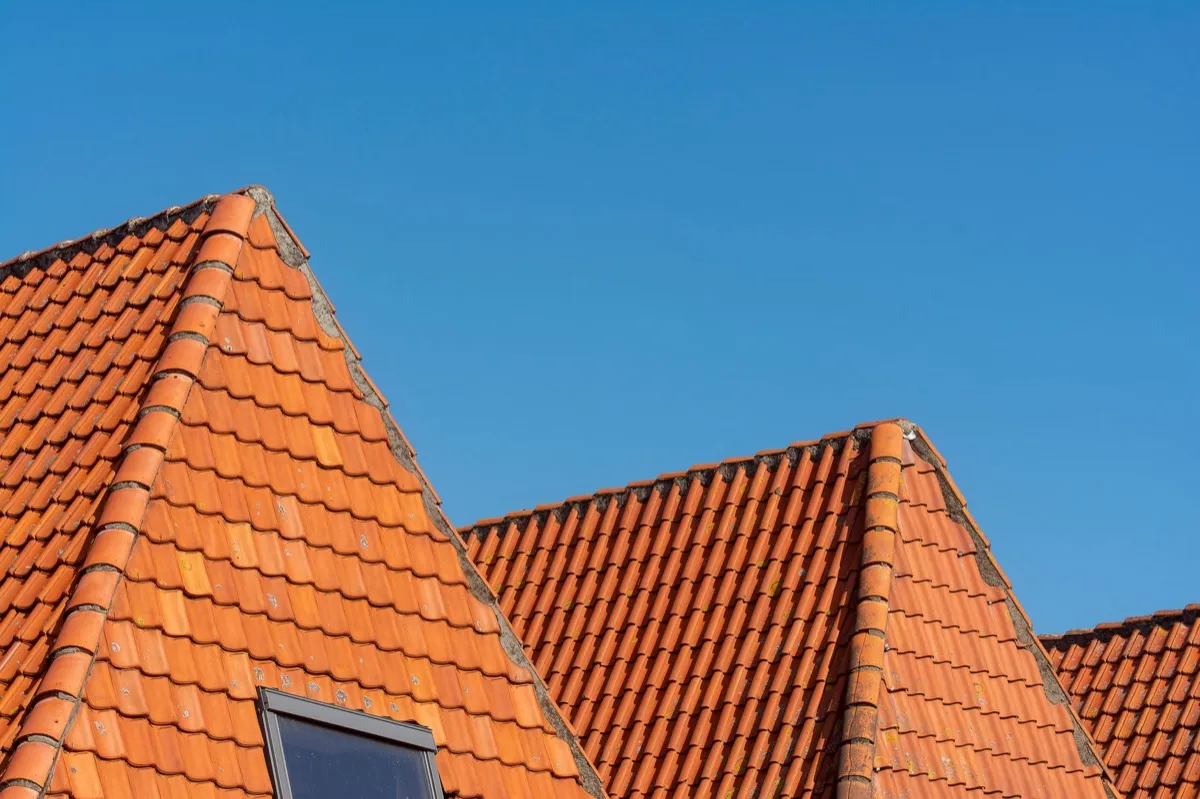Clay barrel tile rooflines on homes in Delaware, OH